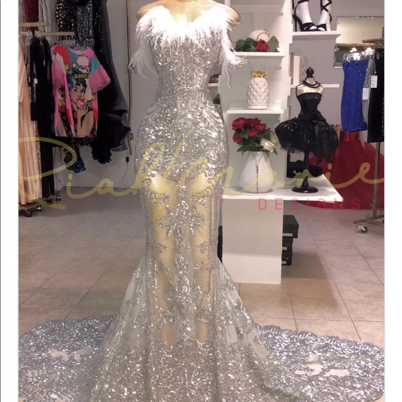 silver prom dress with feathers